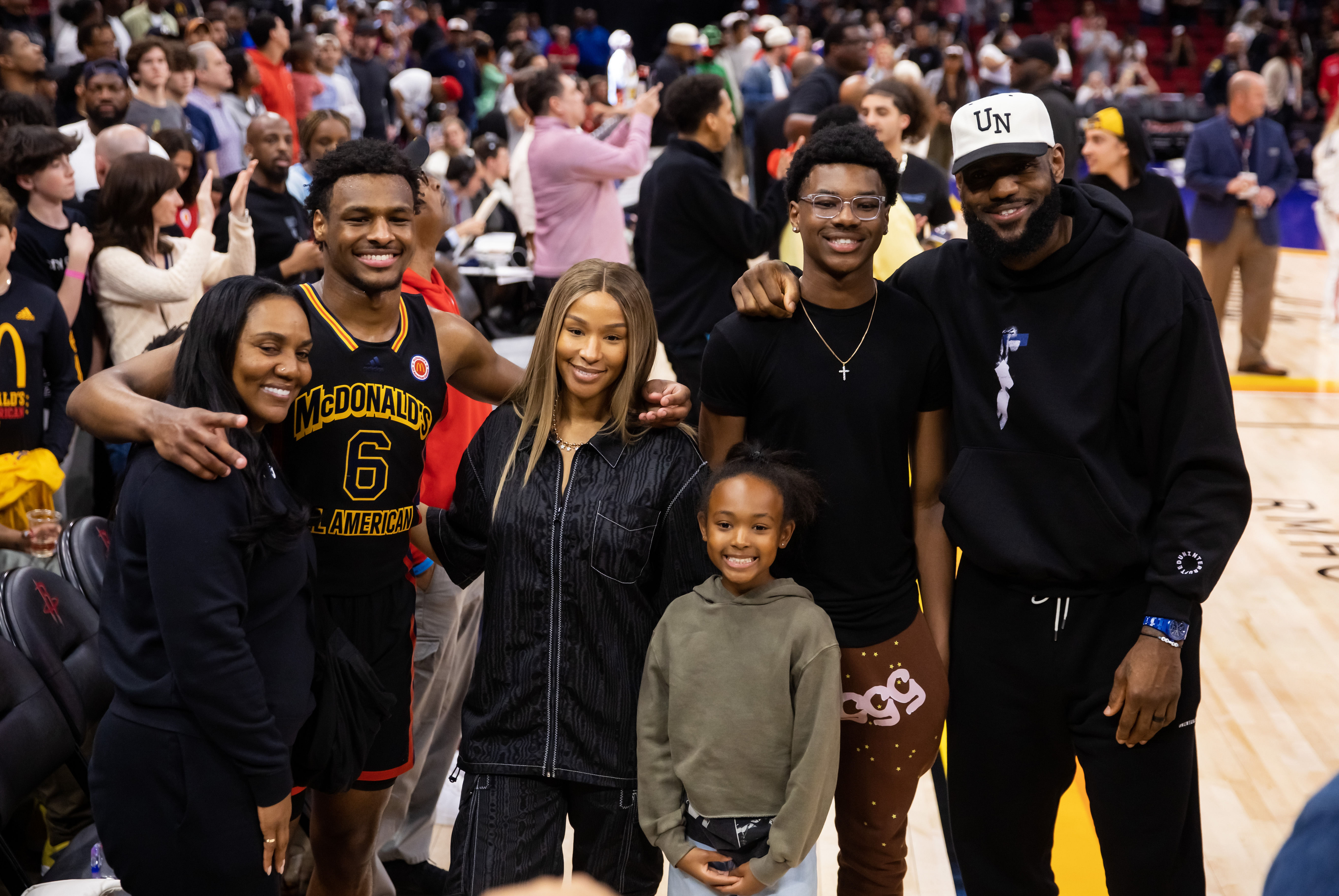 Bronny James (6) poses for a family photo with grandmother Gloria Marie James, mother Savannah James , brother Bryce Maximus James, sister Zhuri Nova James and father LeBron James following the McDonald's All American Boy's high school basketball game - Source: Imagn